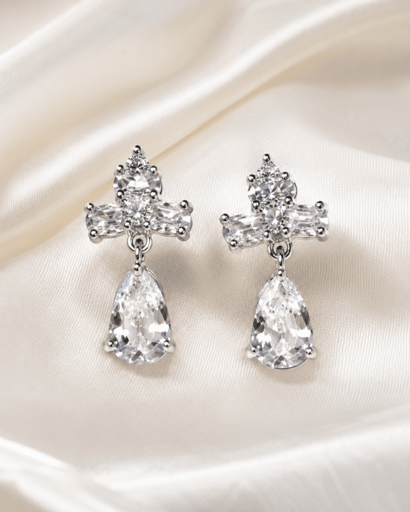 Lumière Crystal Teardrop Earrings styled for an evening look